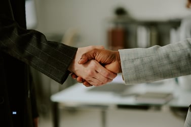 two business people shaking hands